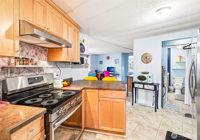 Photo 4 of Manufactured home for sale at 1402 22nd Street NE #300, Auburn, WA 98002 | MLS# NWM2571993 | Listing updated on 2026-09-29