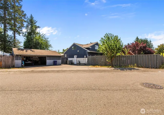 Photo 2 of Single family home for sale at 302 115th St E, Tacoma, WA 98445 | MLS# NWM2572088 | Listing updated on 2026-09-25