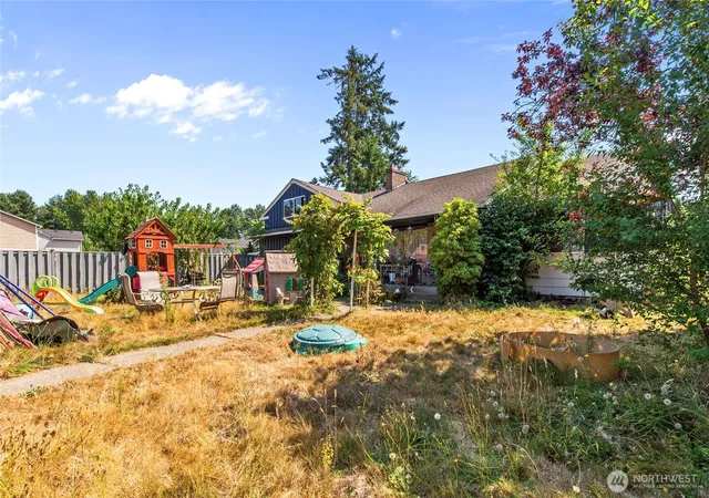 Photo 3 of Single family home for sale at 302 115th St E, Tacoma, WA 98445 | MLS# NWM2572088 | Listing updated on 2026-09-25