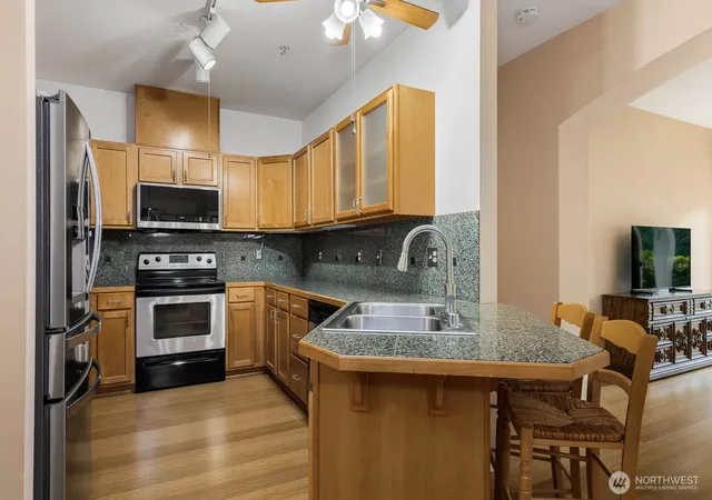 Photo 3 of Condo for sale at 14335 Simonds Rd Ne #A102, Kirkland, WA 98034 | MLS# NWM2572252 | Listing updated on 2026-09-25