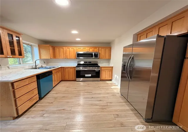 Photo 3 of Single family home for sale at 9506 10th Ave E, Tacoma, WA 98445 | MLS# NWM2572954 | Listing updated on 2026-09-19