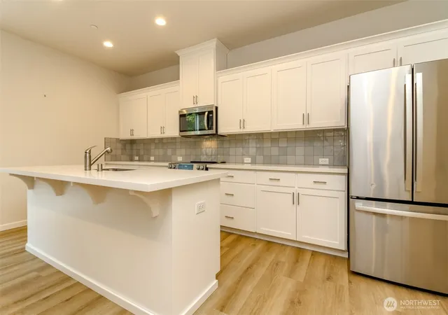 Photo 4 of Single family home for sale at 7058 Quinn Ct Se, Tumwater, WA 98501 | MLS# NWM2573651 | Listing updated on 2026-09-30