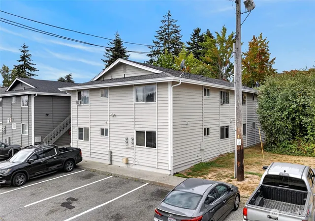Photo 3 of Multi family home for sale at 1101 S Woodlawn St #1-4, Tacoma, WA 98465 | MLS# NWM2573776 | Listing updated on 2026-09-24
