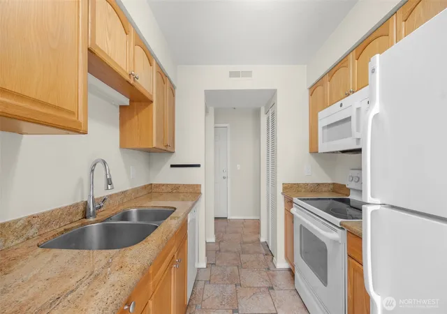 Photo 3 of Condo for sale at 12525 Ne 145th Pl #F107, Kirkland, WA 98034 | MLS# NWM2573806 | Listing updated on 2026-09-25