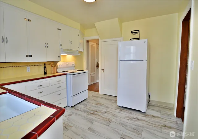 Photo 3 of Single family home for sale at 229 S 57th St, Tacoma, WA 98408 | MLS# NWM2573816 | Listing updated on 2026-09-25
