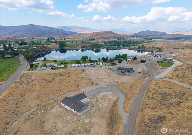 Photo 3 of Single family home for sale at 21 Bide A Wee Rd, Omak, WA 98841 | MLS# NWM2573884 | Listing updated on 2026-09-25