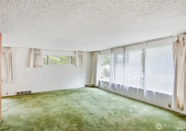 Photo 3 of Sale Pending at 3020 E Yesler Wy, Seattle, WA 98122 | MLS# NWM2574020 | Listing updated on 2026-09-21