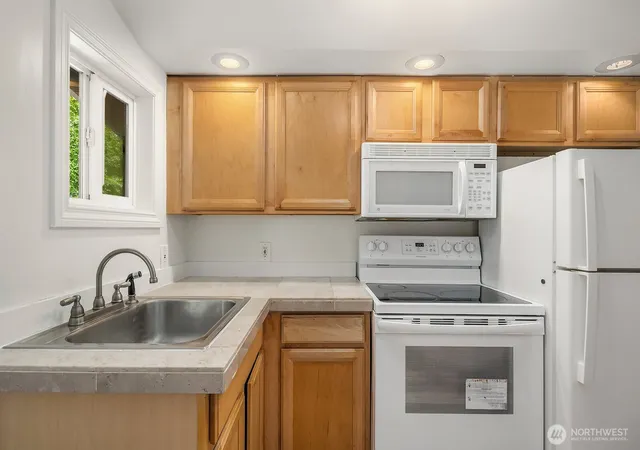 Photo 3 of Multi family home for sale at 5444 Kirkwood Pl N, Seattle, WA 98103 | MLS# NWM2574470 | Listing updated on 2026-09-25