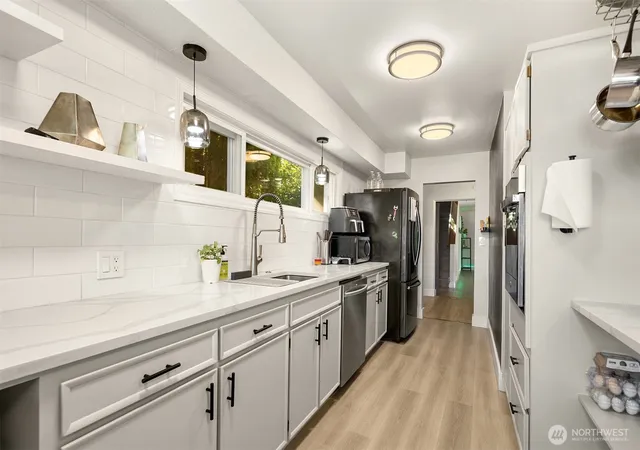 Photo 3 of Single family home for sale at 1405 S 100th St, Seattle, WA 98168 | MLS# NWM2574696 | Listing updated on 2026-09-24
