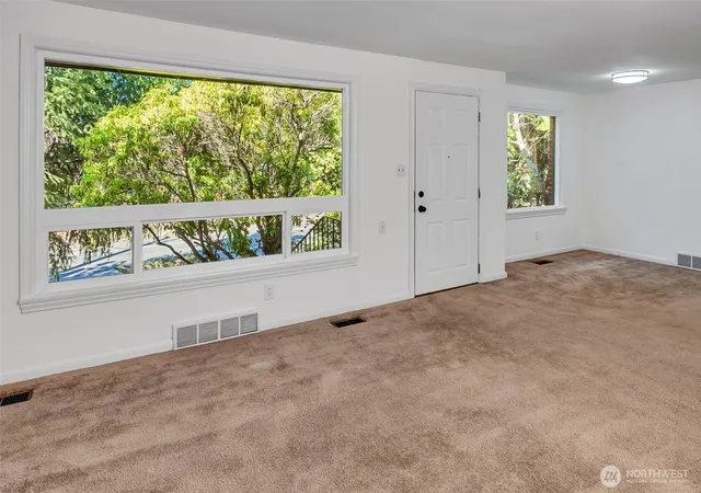 Photo 3 of Single family home for sale at 12004 5th Avenue NE, Seattle, WA 98125 | MLS# NWM2575936 | Listing updated on 2026-09-30