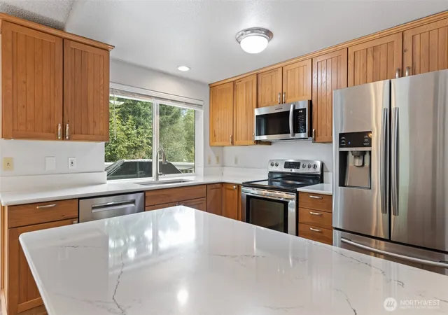 Photo 3 of Single family home for sale at 12217 221st Avenue Ct E, Bonney Lake, WA 98391 | MLS# NWM2577020 | Listing updated on 2026-09-25