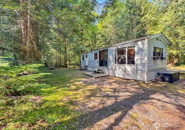 Photo 1 of Manufactured home for sale at 144 5 Big River Blvd W, Deming, WA 98244 | MLS# NWM2577054 | Listing updated on 2026-09-25