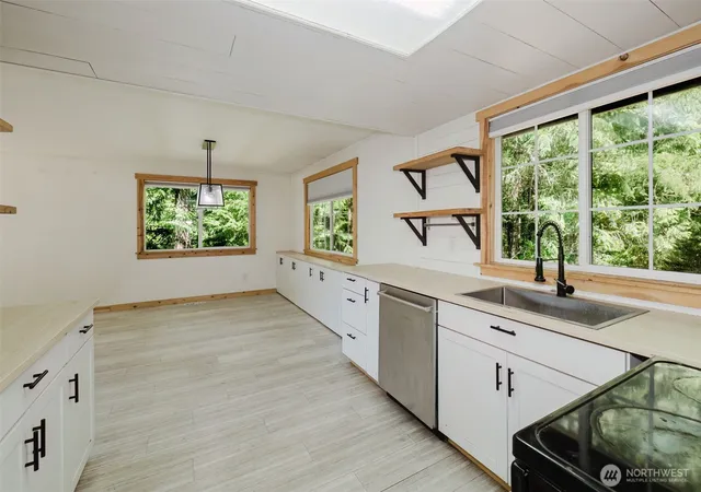 Photo 4 of Single family home for sale at 8325 Seabeck Hwy NW, Bremerton, WA 98312 | MLS# NWM2577546 | Listing updated on 2026-09-21