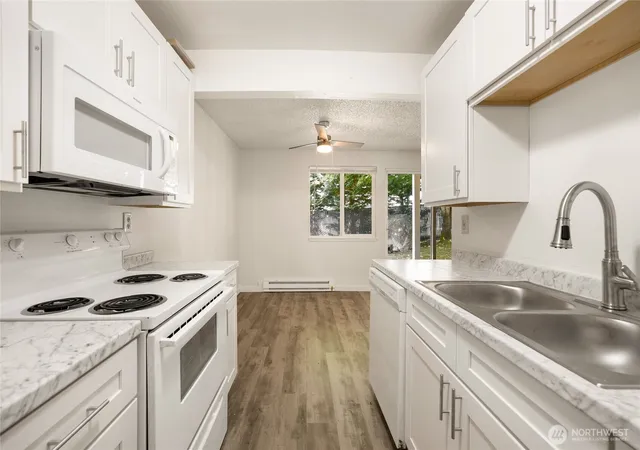 Photo 4 of Multi family home for sale at 3909 Mason Loop Rd, Tacoma, WA 98409 | MLS# NWM2578180 | Listing updated on 2026-09-25