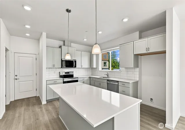 Photo 4 of Single family home for sale at 1216 Tacoma Ct NE #1, Renton, WA 98056 | MLS# NWM2578769 | Listing updated on 2026-10-01