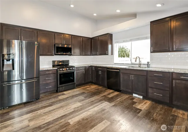 Photo 3 of Single family home for sale at 1228 143rd Street E, Tacoma, WA 98445 | MLS# NWM2579136 | Listing updated on 2026-09-30