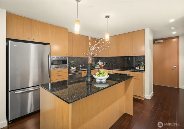 Photo 4 of Condo for sale at 909 5th Avenue #402, Seattle, WA 98164 | MLS# NWM2579302 | Listing updated on 2026-09-30