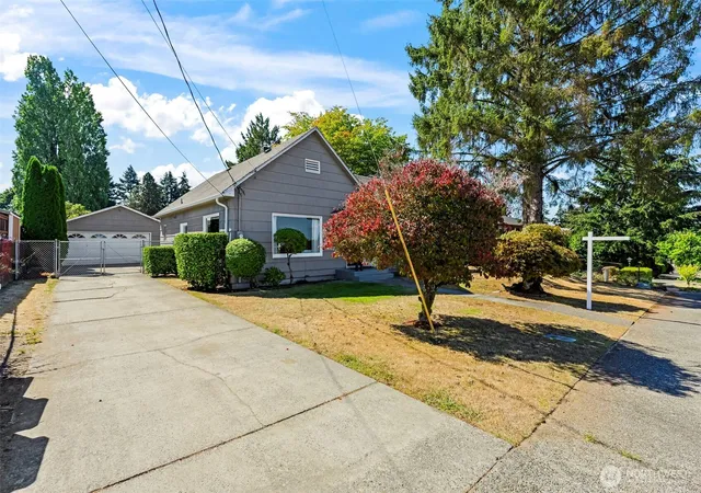 Photo 2 of Single family home for sale at 7412 S 8th Street, Tacoma, WA 98465 | MLS# NWM2579868 | Listing updated on 2026-09-23