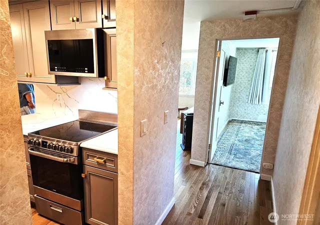 Photo 3 of Condo for sale at 919 2nd Avenue W #407, Seattle, WA 98119 | MLS# NWM2579875 | Listing updated on 2026-09-25