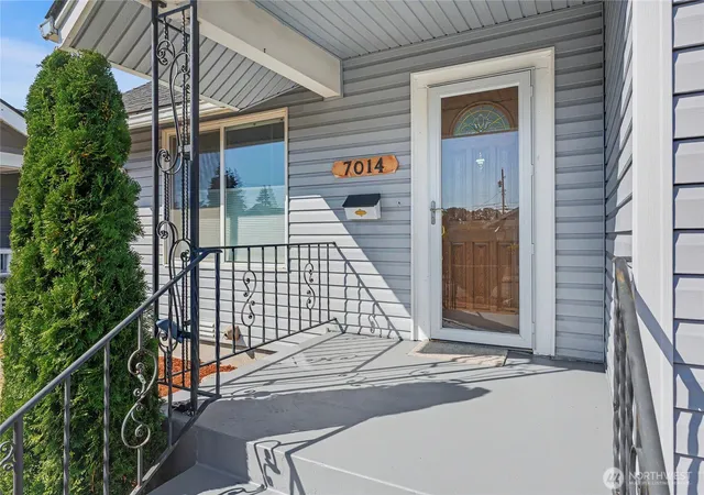 Photo 3 of Single family home for sale at 7014 S Montgomery St, Tacoma, WA 98409 | MLS# NWM2579880 | Listing updated on 2026-09-24