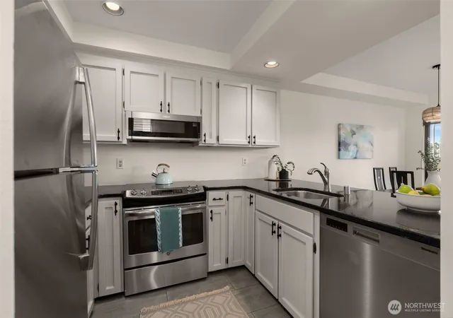 Photo 4 of Townhouse for sale at 2831 14th Avenue W #2, Seattle, WA 98119 | MLS# NWM2580690 | Listing updated on 2026-09-29