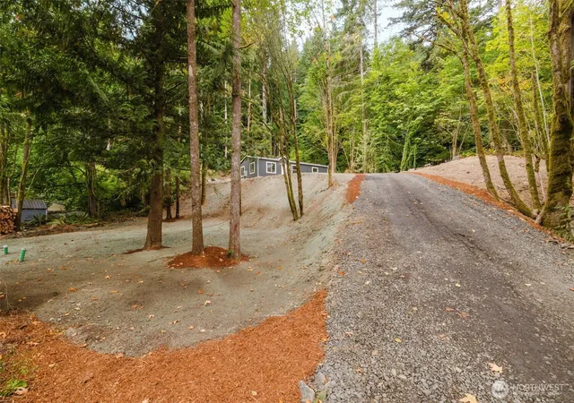 Photo 1 of Manufactured home for sale at 150 NE Steelhead Dr S, Belfair, WA 98528 | MLS# NWM2581063 | Listing updated on 2026-10-01