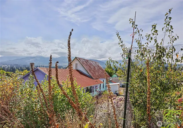 Photo 2 of Single family home for sale at 1027 W 7th Street, Port Angeles, WA 98363 | MLS# NWM2581120 | Listing updated on 2026-09-25