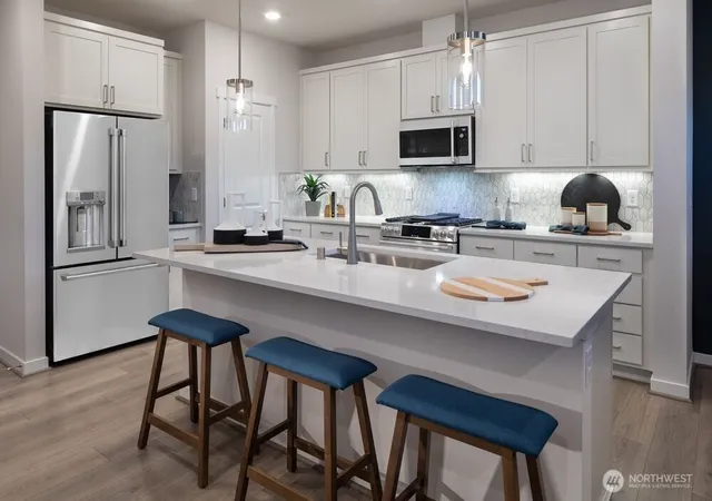 Photo 2 of Townhouse for sale at 13209 Ne 127th Court #B, Kirkland, WA 98034 | MLS# NWM2581244 | Listing updated on 2026-10-02