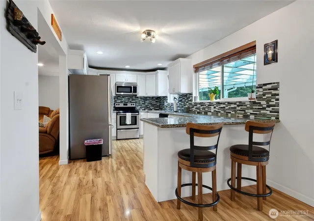 Photo 4 of Single family home for sale at 11013 Lundstrom Dr SW, Lakewood, WA 98498 | MLS# NWM2581510 | Listing updated on 2026-09-25