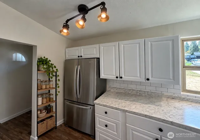 Photo 3 of Single family home for sale at 9015 Hipkins Rd SW, Lakewood, WA 98498 | MLS# NWM2582209 | Listing updated on 2026-09-29