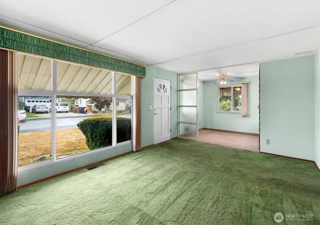 Photo 2 of Single family home for sale at 7037 E B St, Tacoma, WA 98404 | MLS# NWM2582279 | Listing updated on 2026-10-01