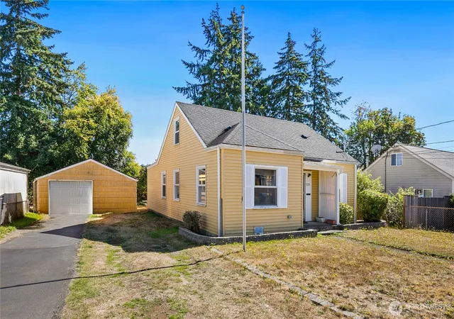 Photo 2 of Single family home for sale at 5215 Mcdacer Ave, Tacoma, WA 98404 | MLS# NWM2582565 | Listing updated on 2026-09-23