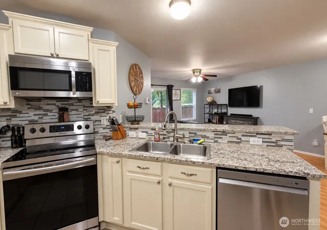 Photo 3 of Single family home for sale at 996 G St SW, Tumwater, WA 98512 | MLS# NWM2582752 | Listing updated on 2026-09-30