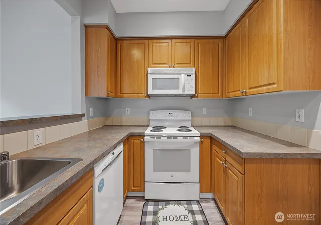 Photo 3 of Condo for sale at 13000 Admiralty Way #J101, Everett, WA 98204 | MLS# NWM2583735 | Listing updated on 2026-09-30
