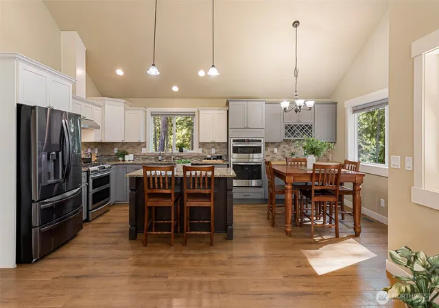 Photo 2 of Single family home for sale at 7981 SE Mossy Pond Ct, Olalla, WA 98359 | MLS# NWM2583879 | Listing updated on 2026-09-18