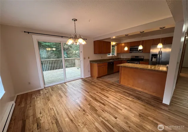 Photo 4 of Multi family home for sale at 13807 Greenwood Ave N, Seattle, WA 98133 | MLS# NWM2584252 | Listing updated on 2026-09-23