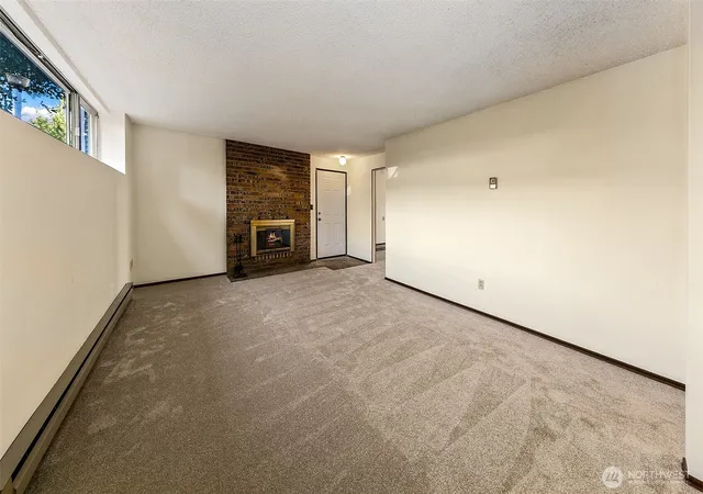 Photo 3 of Multi family home for sale at 1145 N 93rd Street, Seattle, WA 98103 | MLS# NWM2584377 | Listing updated on 2026-09-25