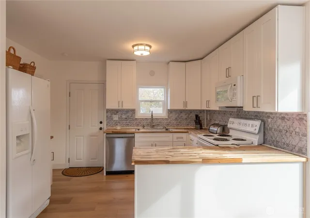Photo 3 of Single family home for sale at 3605 S K St, Tacoma, WA 98418 | MLS# NWM2585107 | Listing updated on 2026-10-19
