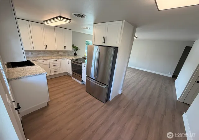 Photo 4 of Single family home for sale at 857 S 72nd Street, Tacoma, WA 98408 | MLS# NWM2585305 | Listing updated on 2026-09-22