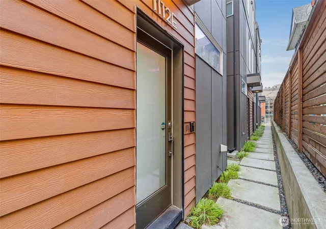 Photo 3 of Townhouse for sale at 1112 13th Avenue #E, Seattle, WA 98122 | MLS# NWM2585321 | Listing updated on 2026-09-22