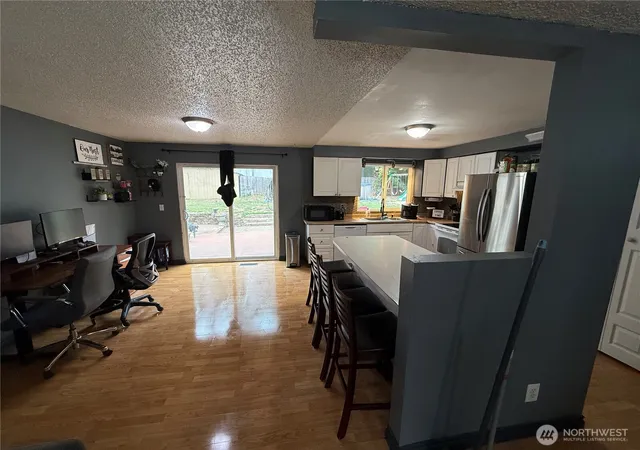 Photo 3 of Single family home for sale at 8910 Ne Quinault Loop, Olympia, WA 98516 | MLS# NWM2585396 | Listing updated on 2026-09-26