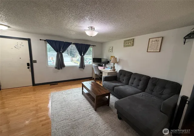 Photo 3 of Single family home for sale at 8910 NE Quinault Loop, Olympia, WA 98516 | MLS# NWM2585396 | Listing updated on 2026-09-26