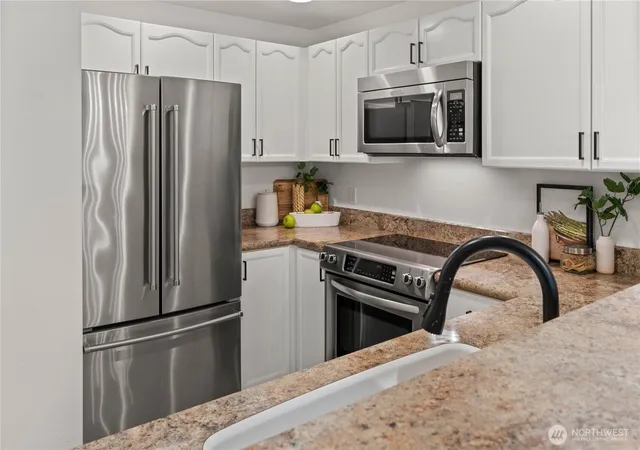 Photo 2 of Condo for sale at 1628 118th Avenue Se #F217, Bellevue, WA 98005 | MLS# NWM2585512 | Listing updated on 2026-09-27