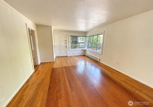Photo 3 of Single family home for sale at 1717 E Thomas St, Seattle, WA 98112 | MLS# NWM2585628 | Listing updated on 2026-09-30