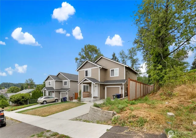 Photo 2 of Single family home for sale at 1202 E 58th Street, Tacoma, WA 98404 | MLS# NWM2585823 | Listing updated on 2026-09-25