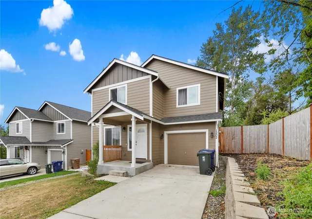 Photo 3 of Single family home for sale at 1202 E 58th Street, Tacoma, WA 98404 | MLS# NWM2585823 | Listing updated on 2026-09-25