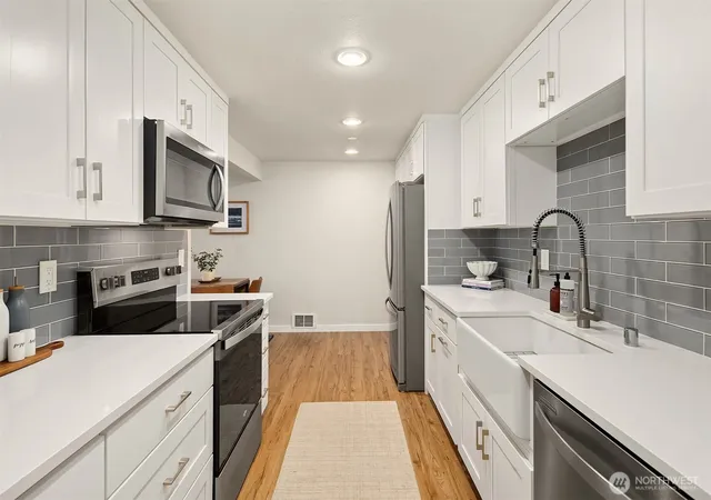 Photo 3 of Condo for sale at 11556 Greenwood Ave N #102, Seattle, WA 98133 | MLS# NWM2585974 | Listing updated on 2026-09-24