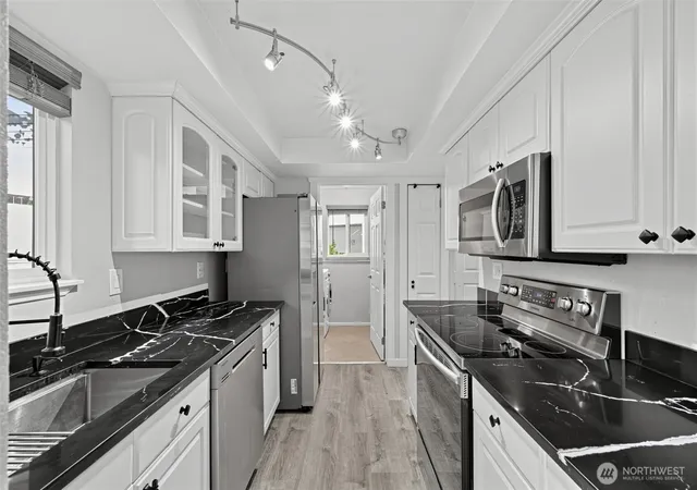 Photo 3 of Condo for sale at 10014 Ne 122nd Street #D, Kirkland, WA 98034 | MLS# NWM2586782 | Listing updated on 2026-09-25