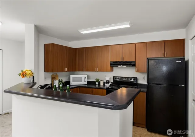 Photo 4 of Condo for sale at 7711 NE 175th Street #F202, Kenmore, WA 98028 | MLS# NWM2587296 | Listing updated on 2026-10-02