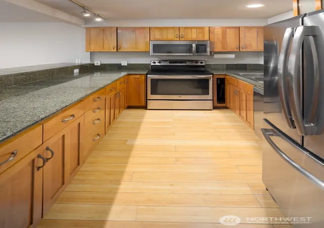 Photo 3 of Condo for sale at 150 Melrose Ave E #407, Seattle, WA 98102 | MLS# NWM2587326 | Listing updated on 2026-09-25